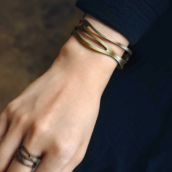 Bracciale rigido regolabile con polsino in ottone e rame curvo vintage Buddha Stones Wealth