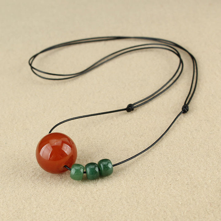 Buddha Stones Agata rossa Avventurina verde Perline di semi di Bodhi verde Collana con ciondolo in corda di cuoio calmo