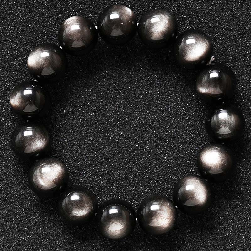 Braccialetto di protezione lenitiva in ossidiana lucida d'argento naturale Buddha Stones