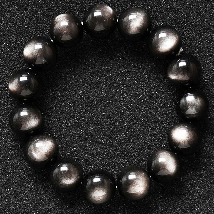 Braccialetto di protezione lenitiva in ossidiana lucida d'argento naturale Buddha Stones
