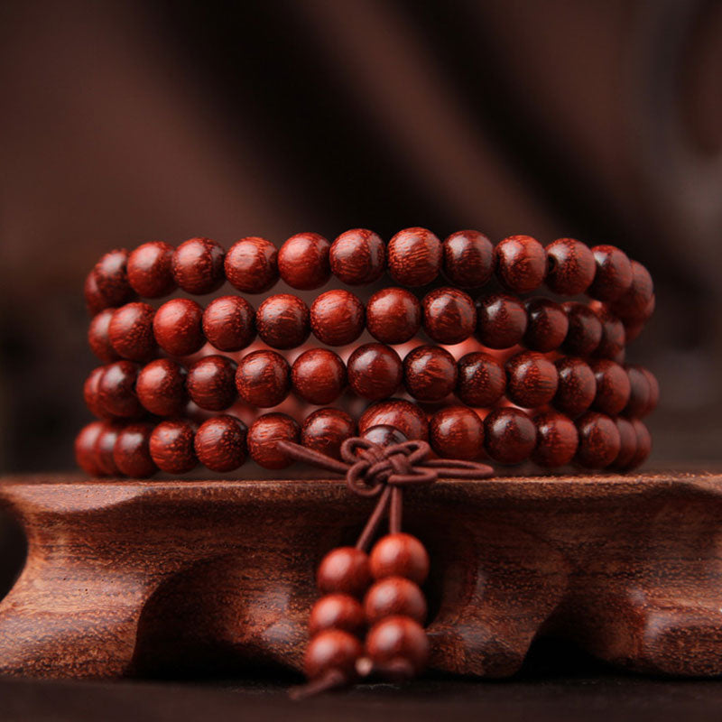 Braccialetto di meditazione Mala con 108 perle di legno di sandalo rosso e foglie piccole tibetane Buddha Stones - image 0