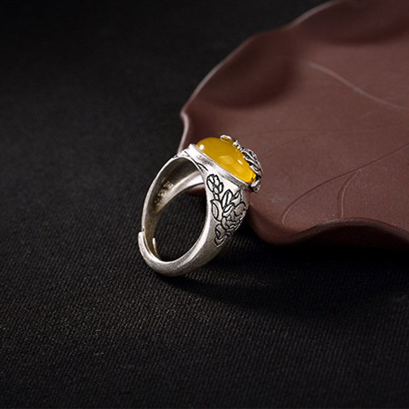 Anello regolabile con protezione e benedizione del loto in citrino Buddha Stones