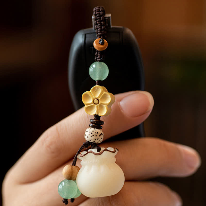 Buddha Stones Seme di Bodhi naturale Sacchetto di soldi Fiore Benedizione Prosperità Portachiavi