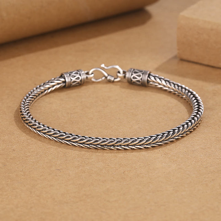 Bracciale con fibbia della ricchezza intrecciata a forma di chiglia di drago vintage Buddha Stones