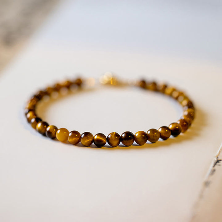 Braccialetto di protezione del coraggio in pietra naturale occhio di tigre placcato oro 14K Buddha Stones