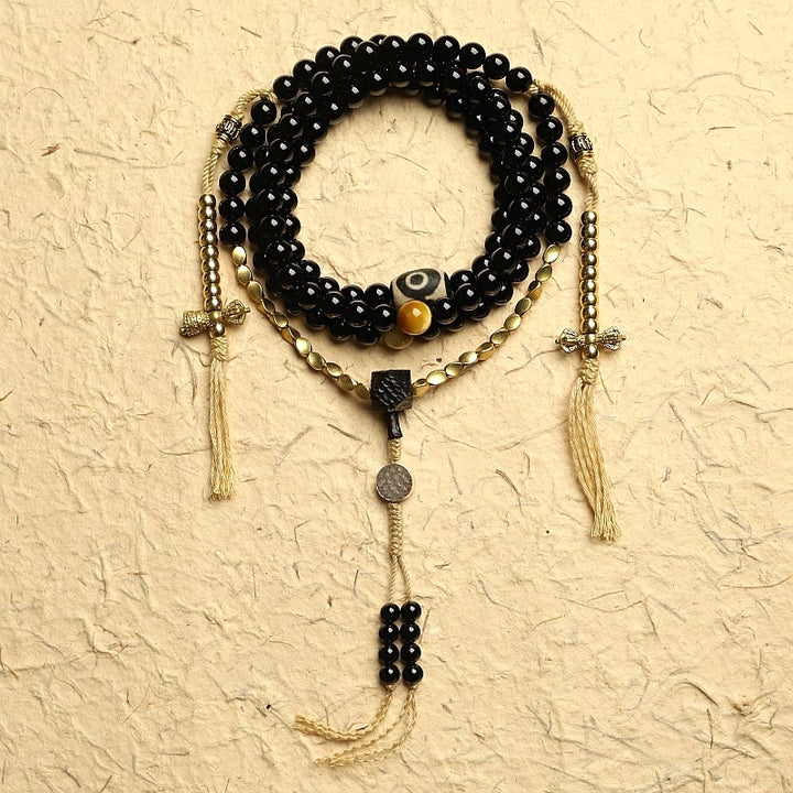 Buddha Stones Tibetano 108 Mala Beads Onice Nero Tre Occhi Dzi Beads Bracciale di Protezione - 8 mm - Onice nero e rame - image 0