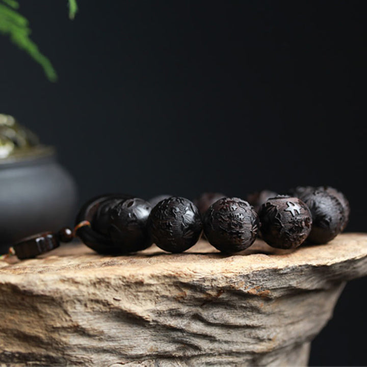 Braccialetto di equilibrio con zucca inciso con carattere cinese Yin Yang in legno di ebano Buddha Stones