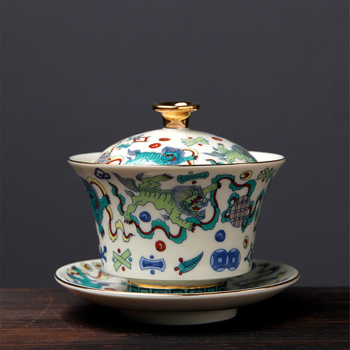 Buddha Stones Retro Prugna Fiore Pino Bambù Fenice Kirin Ceramica Gaiwan Sancai Tazza da tè Kung Fu Tazza da tè e piattino con coperchio