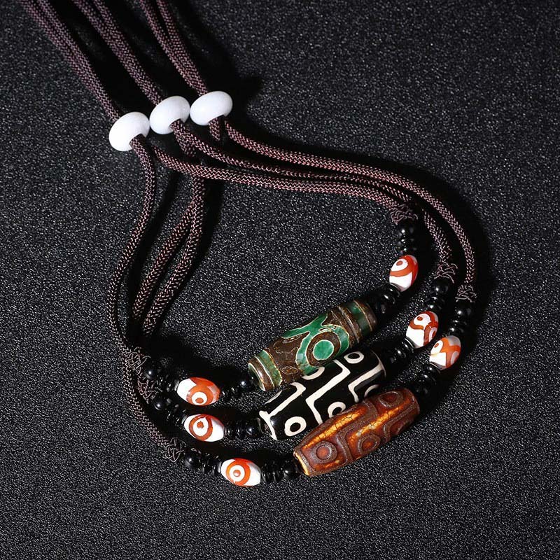 Buddha Stones Collana di perline tibetane Dzi a nove occhi con cordino protettivo - image 9
