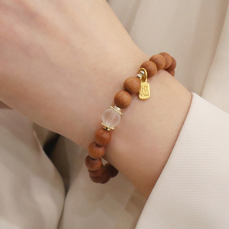 Braccialetto di protezione con ciondolo a forma di carattere Fu con occhio di gatto Buddha Stones in legno di sandalo