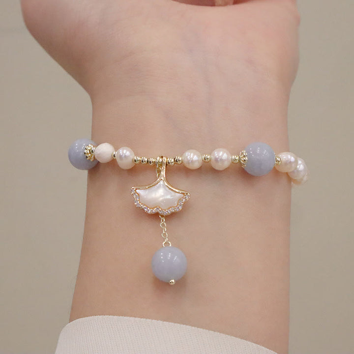 Braccialetto con ciondolo a forma di farfalla con foglia di ginkgo e perle di acquamarina naturale Buddha Stones