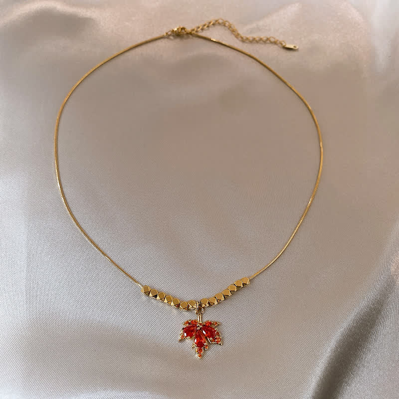 Collana con ciondolo, anello e orecchini con foglia d'acero e zircone, portafortuna , Buddha Stones