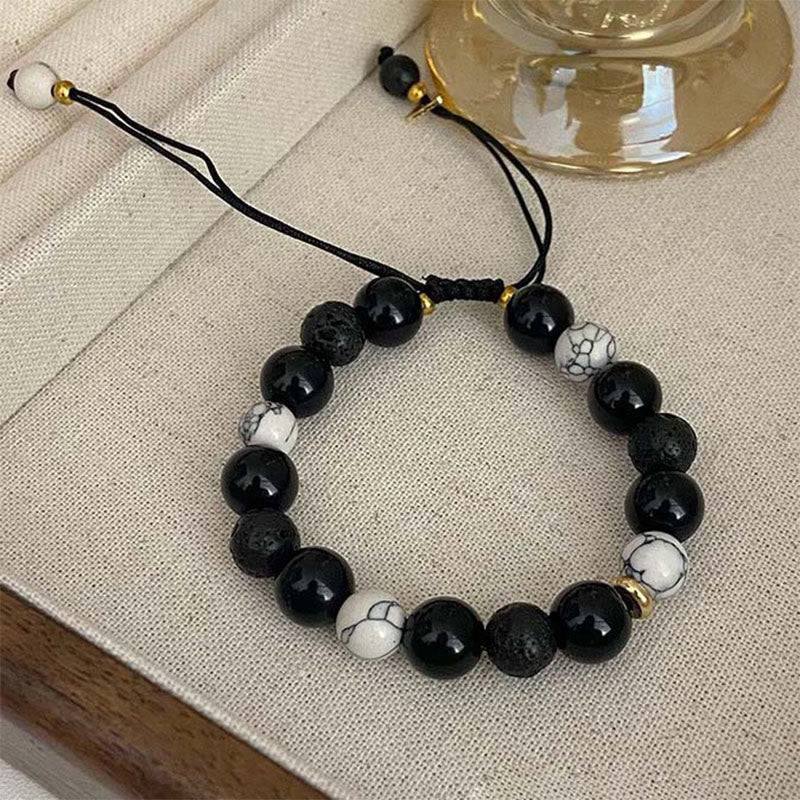 Braccialetto di forza Yin Yang in pietra lavica di ossidiana nera Buddha Stones