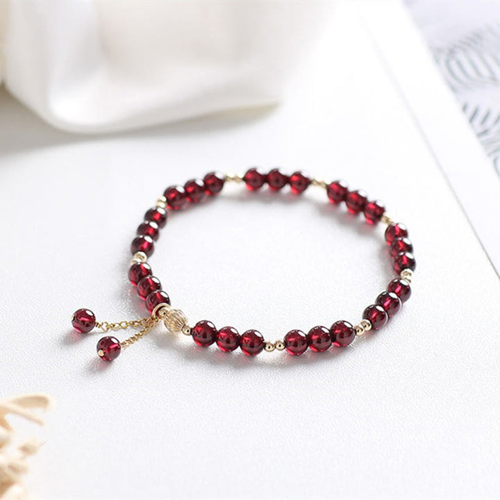 Bracciale Buddha Stones in lega placcata oro 14K con granato naturale e calma - Granato (Purificazione♥Protezione) - image 0