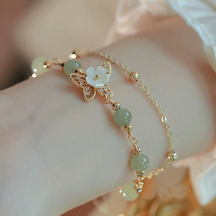 Braccialetto portafortuna a doppio strato con fiore in pietra tridacna a farfalla in giada placcato oro 14K Buddha Stones