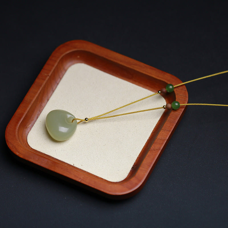 Collana con ciondolo in corda della prosperità con motivo a piccola borsa in giada naturale di Hetian