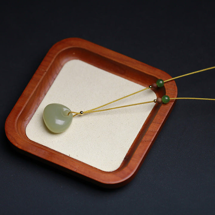 Collana con ciondolo in corda della prosperità con motivo a piccola borsa in giada naturale di Hetian