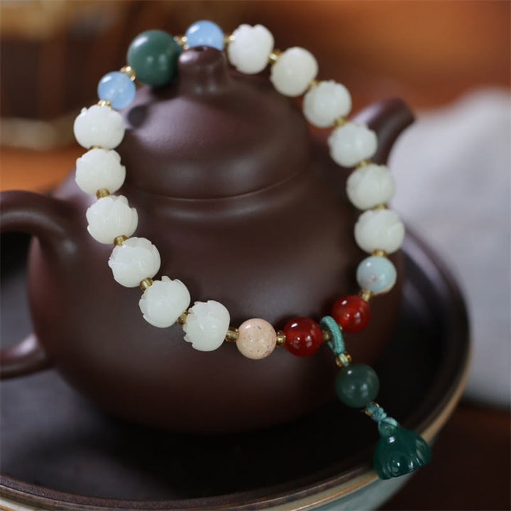 Braccialetto di armonia di pace intagliato con Buddha Stones