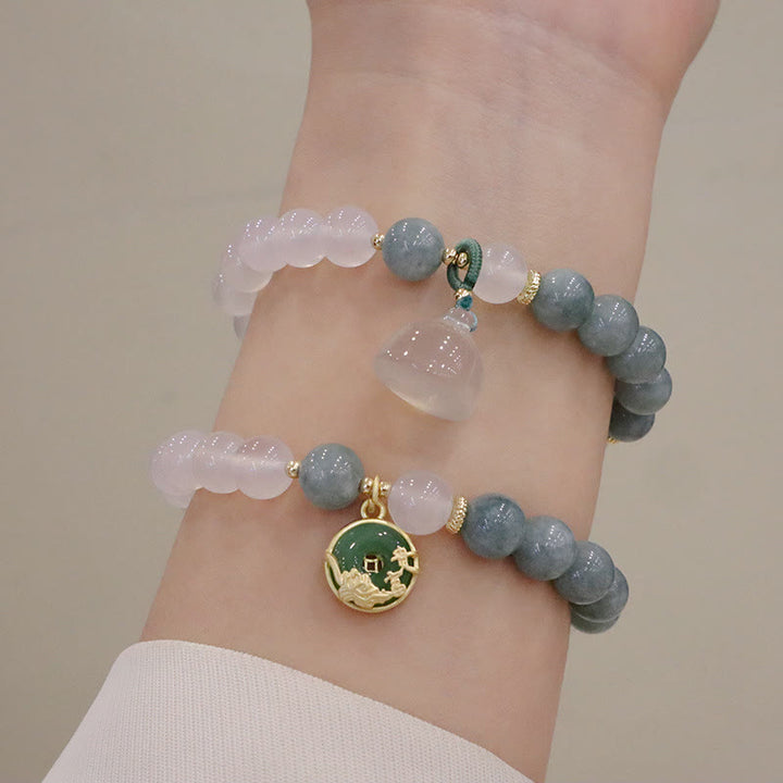 Braccialetto di protezione con fibbia della pace, fiore di loto, agata bianca e giada Buddha Stones